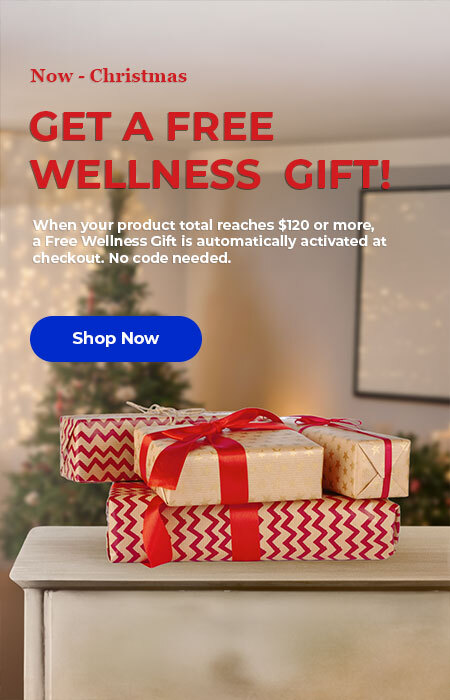 christmas gifts sitting on a desktop. Get a free wellness gift.