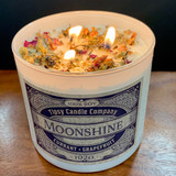 Moonshine 3 wick soy candle - lifestyle picture.