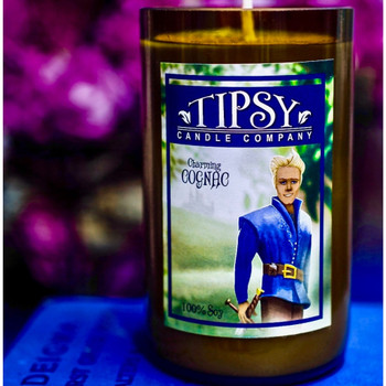 Charming Cognac Soy candle.  Fragrances notes include Patchouli, bergamot, sandalwood, Amber, Vanilla.  Candle is 14 ounce candle in recycled wine bottle with 100% Soy and essential oils.  Burn time is approximately 60 hours.