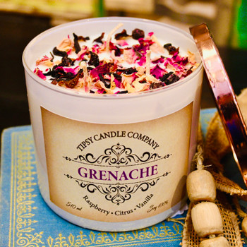 Grenache 17 ounce soy candle made by Tipsy Candle Company.  Front View with copper lid off.