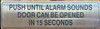 PUSH UNTIL ALARM SOUNDS SILVER SIGN