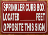 SPRINKLER CURB BOX LOCATED FEET OPPOSITE THIS SIGN SIGN