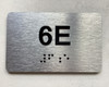 APT# 6E SILVER Braille Sign