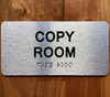 The Copy Room Ada Sign