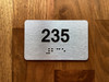 Apartment number 235 Compliance Sign