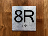 8R Elevator Jamb Plate Compliance Sign