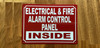 red-electrical-and-fire-alarm-control-panel-inside-screw-mount-sign.jpg