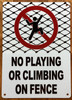 no-playing-or-climbing-on-fence-5x7-white-aluminum-sign.jpg