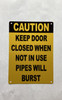 caution-keep-door-closed-when-not-in-use-pipes-will-burst-aluminum-with-mounting-holes.jpg