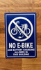 no-e-bike-and-battery-charging-allowed-in-this-building-7x10-blue-aluminum-identification-sign.jpg