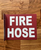 fire-hose-3d-projection-hallway-red-safety-sign.jpg