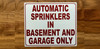 automatic-sprinkler-in-basement-and-garage-only-mounting-holes-equipment-label.jpg