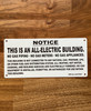 notice-no-gas-in-building-black-safety-sign.jpg