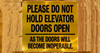 gold-please-do-not-hold-elevator-doors-open-as-the-doors-will-become-inoperable-building-notice.jpg