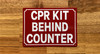 cpr-kit-behind-counter-sign-red-equipment-notice.jpg