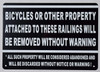 Bicycles OR Other Property Attached to These RAILINGS Will BE Removed Without Warning Sign