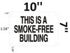 Sign THIS IS A SMOKE-FREE BUILDING .