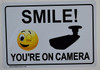2 Pack -Smile You're On Camera Signage