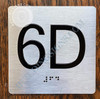 Apartment Number 6D with Braille and Raised Number