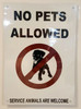 NO PETS ALLOWED sign