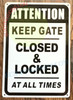 ATTENTION KEEP GATE CLOSED AND LOCK AT ALL TIME signage