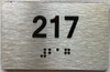 apartment number 217 sign