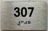 apartment number 307 sign