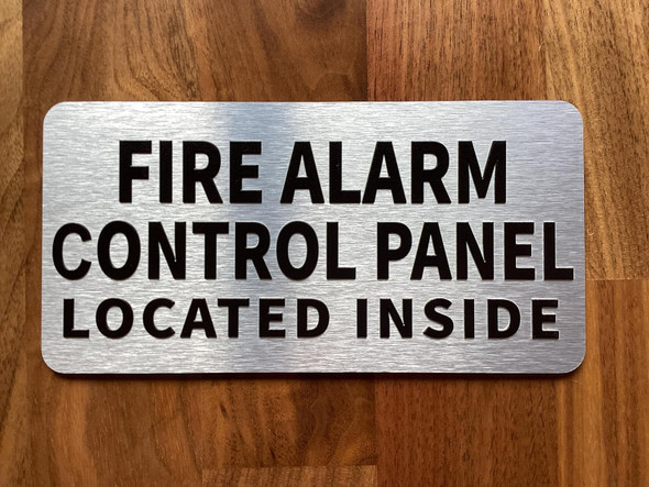 NYC FIRE ALARM CONTROL PANEL LOCATED INSIDE SIGN WITH RAISED LETTERS/IMAGE NO BRAILLE