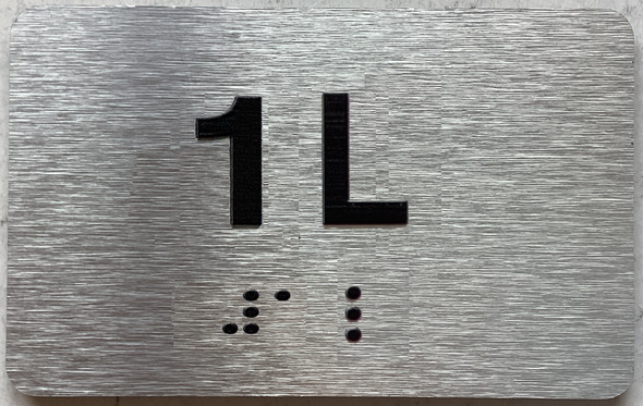 APT# 1L SILVER Sign