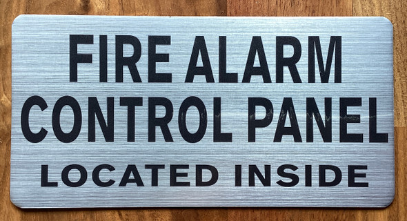 fire-alarm-control-panel-located-inside-4-x-8-silver-aluminum-sign.jpg