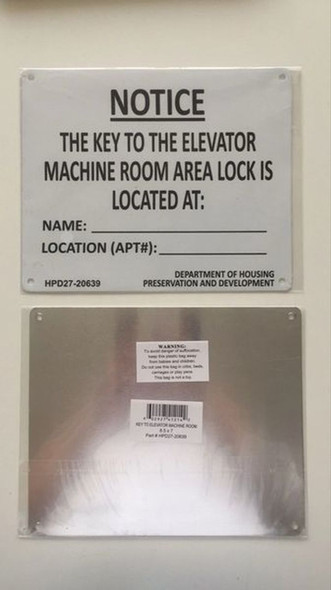 KEY TO THE ELEVATOR MACHINE ROOM SIGN (