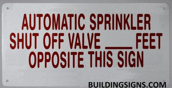 AUTOMATIC SPRINKLER SHUT OFF VALVE FEET OPPOSITE THIS signage