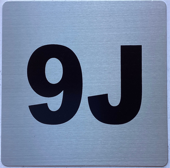 Apartment number 9J sign