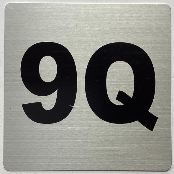 Apartment number 9Q sign