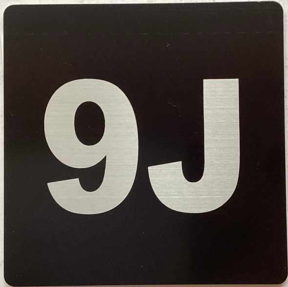 Apartment number 9J sign