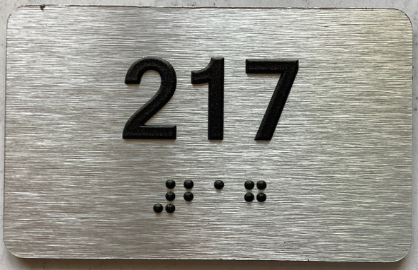 apartment number 217 sign