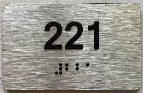 apartment number 221 sign