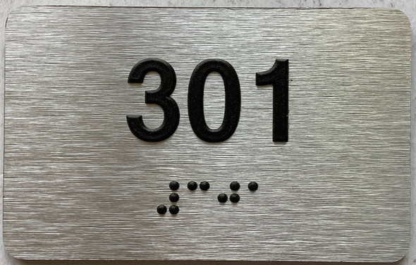 apartment number 301 sign