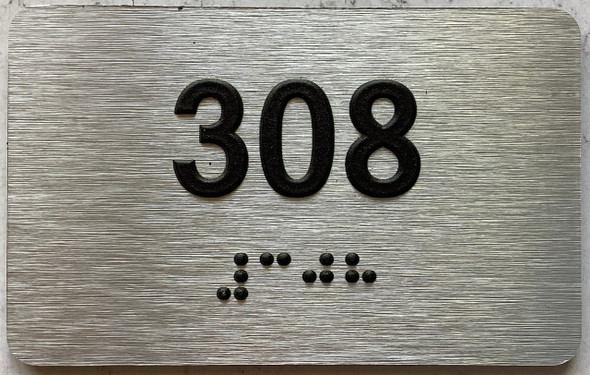 apartment number 308 sign