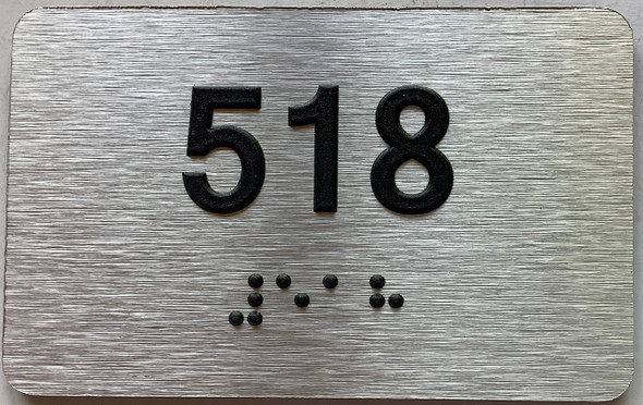 apartment number 518 sign