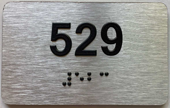 apartment number 529 sign