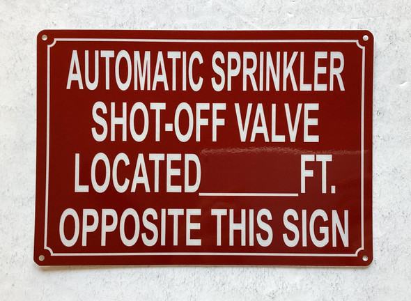 NYC AUTOMATIC SPRINKLER SHUT OFF VALVE LOCATED FEET OPPOSITE THIS SIGN SIGN