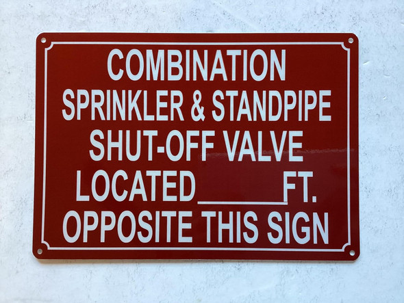 NYC COMBINATION SPRINKLER AND STANDPIPE SHUT OFF VALVE LOCATED FEET OPPOSITE THIS SIGN SIGN