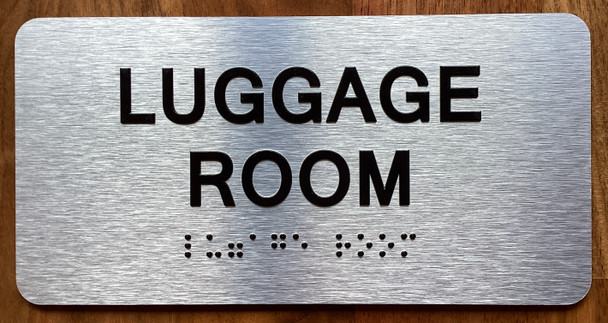 The Luggage Room with Raised Letters & Grade 2 Sign