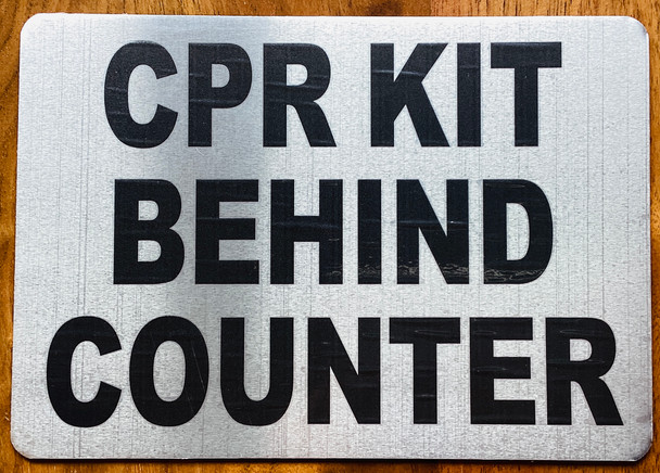 cpr-kit-behing-counter-5-x-7-silver-aluminum-sign.jpg