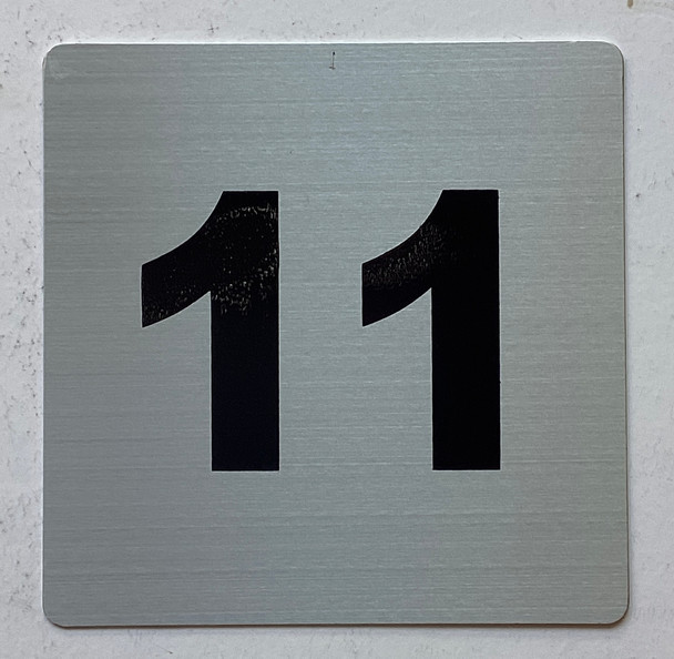 Apartment number 11 sign