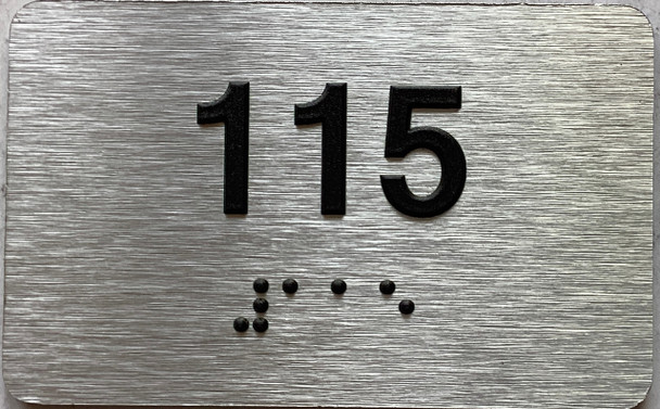 apartment number 115 sign