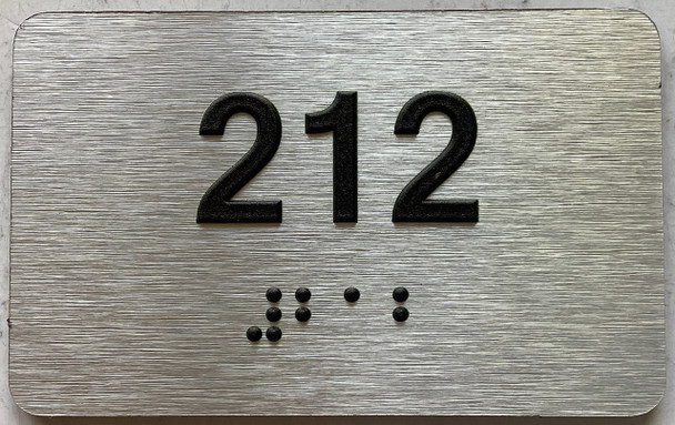 apartment number 212 sign