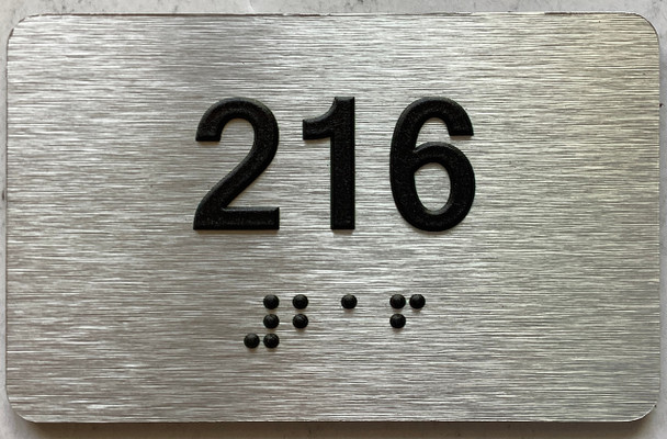 apartment number 216 sign