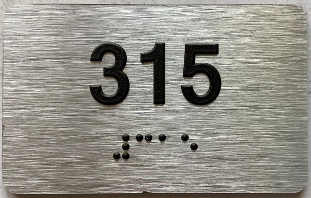 apartment number 315 sign